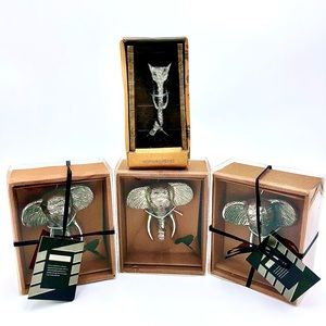 Set of four Silver tone Elephant bottle openers